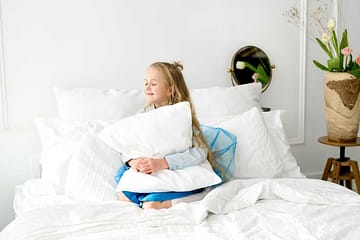 Le rôle de l'oreiller dans la routine du coucher des enfants : pour un sommeil paisible et réparateur
